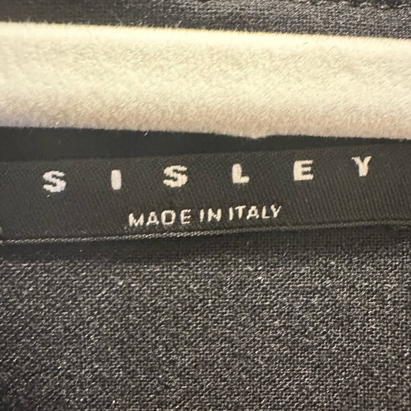 Sisley Dresses & Skirts - Black dress no sleeves very nice and soft made in Italy.